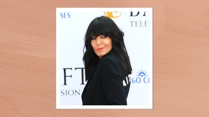 Claudia Winkleman is pictured wearing coral lipstick and a black blazer at the 2023 BAFTA Television Awards with P&O Cruises at The Royal Festival Hall on May 14, 2023 in London, England/ in an orange template