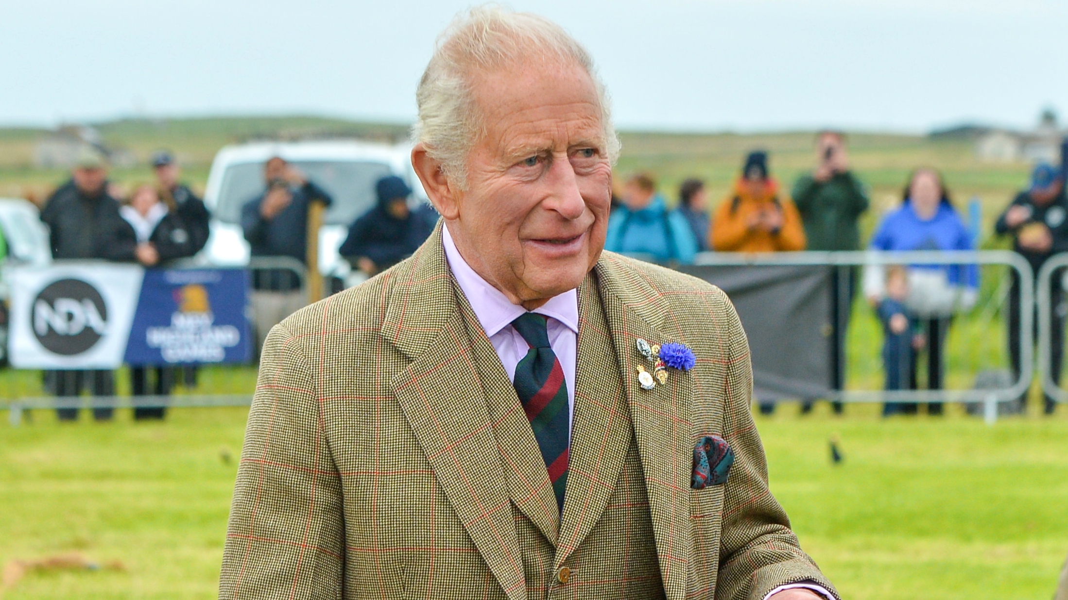 King Charles, wearing traditional Highland dress, meets competitors at the 2026 Mey Highland Games at John O'Groats Showground on August 01, 2026