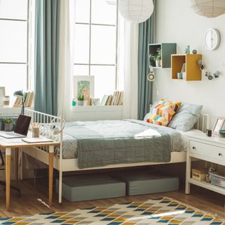 Bedroom with blue and neutral colour scheme