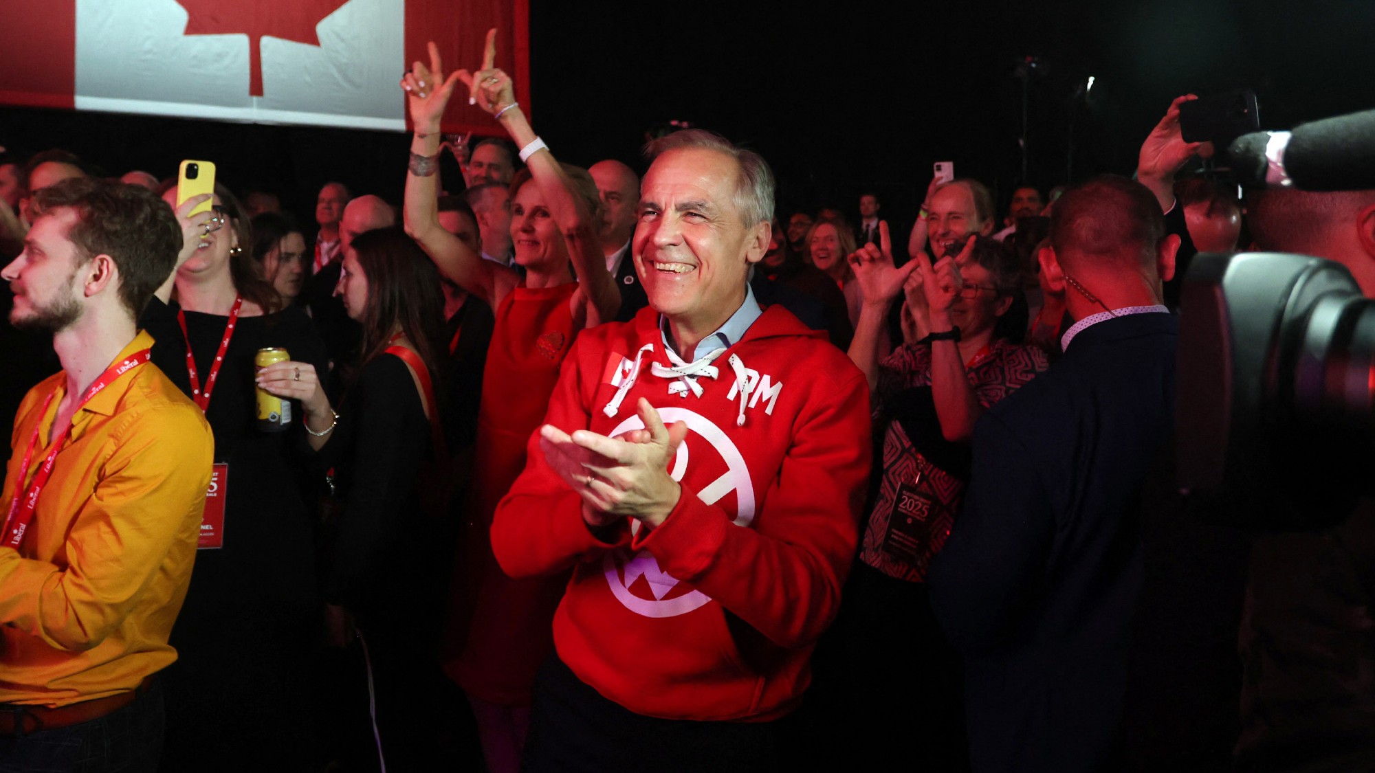 Mark Carney dancing with Liberal Party campaigners in Ottawa after leading the party victory in this week's election