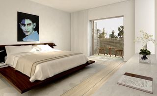 Bedroom interior with wooden framed bed and light bed sheets and picture above bed