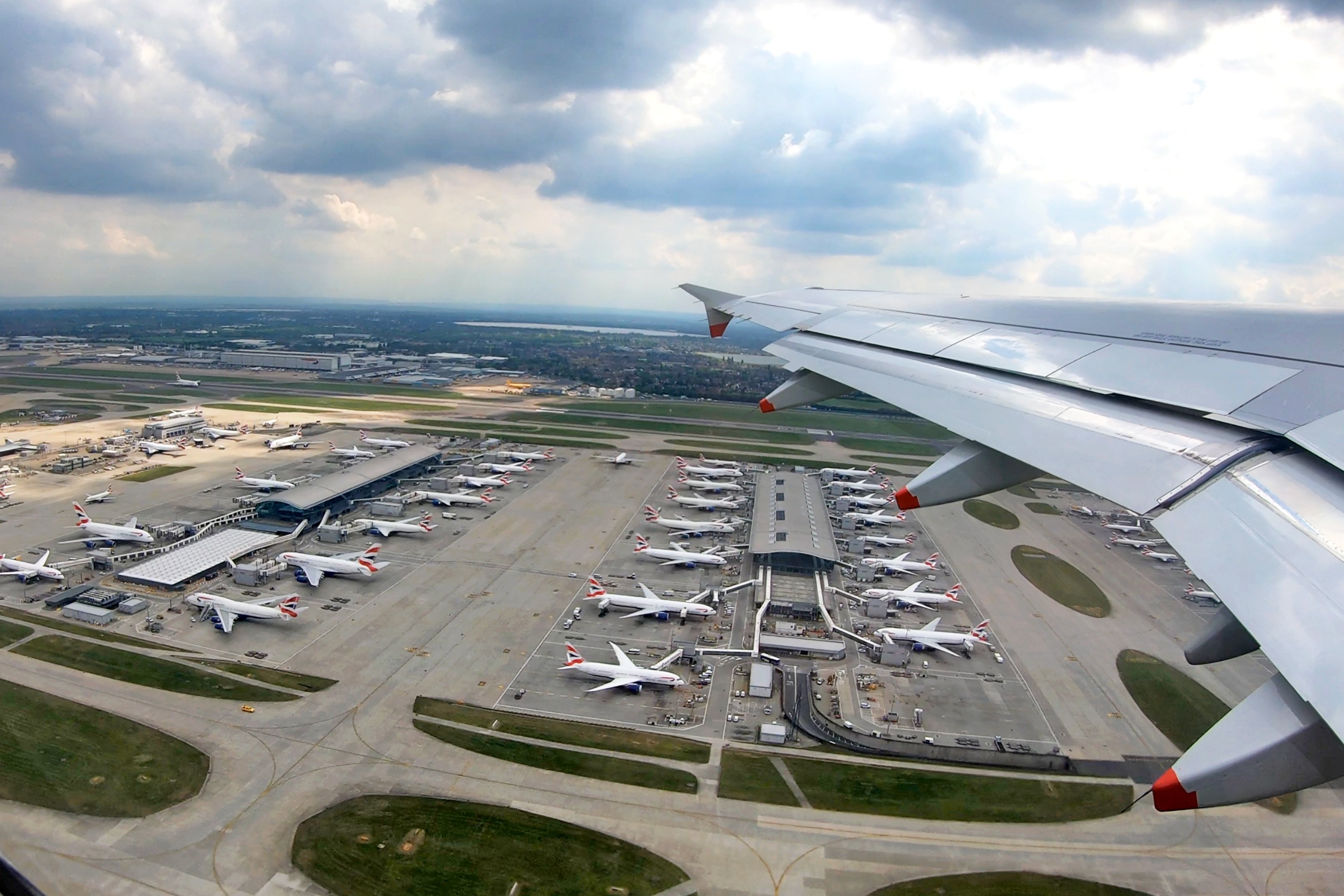 London Heathrow Terminal 5, the home of British Airways. Looking down on the runways and bays of BA planes. Strike action may cause them to be grounded during summer 2019.