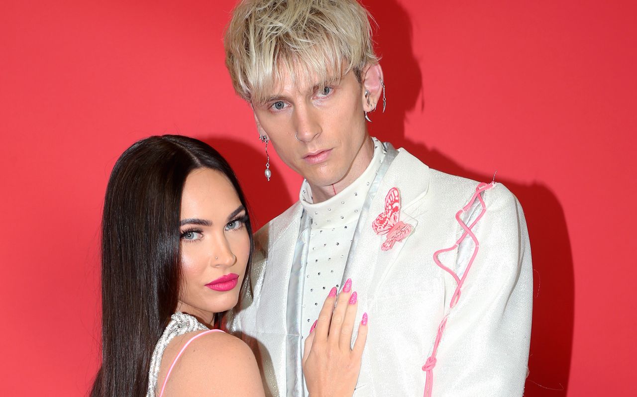 MGK and Megan Fox attend the 2021 iHeartRadio Music Awards at The Dolby Theatre in Los Angeles, California, which was broadcast live on FOX on May 27, 2021