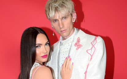 MGK and Megan Fox attend the 2021 iHeartRadio Music Awards at The Dolby Theatre in Los Angeles, California, which was broadcast live on FOX on May 27, 2021