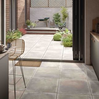 tile giant flooring between indoors and outdoor patio