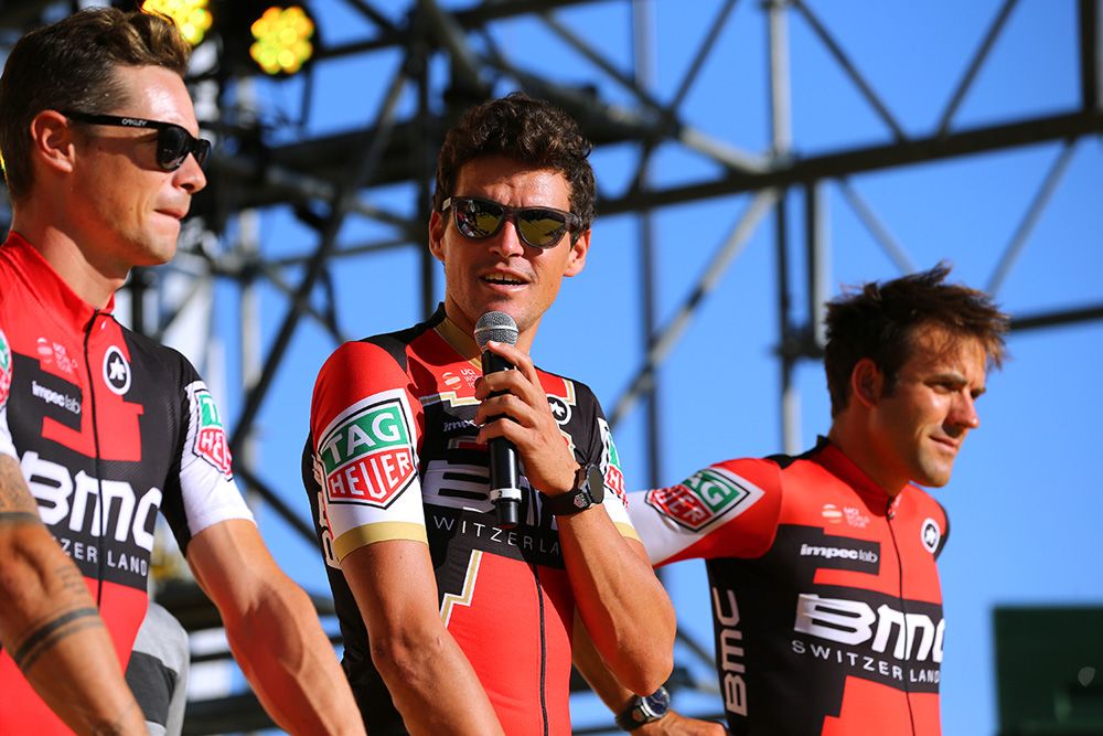 Greg van Avermaet talks on stage at the team presentation