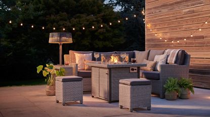 cozy patio ideas: kettler fire pit and sofa