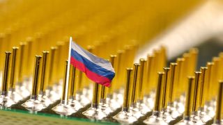 A Russian flag on the pin of a microchip