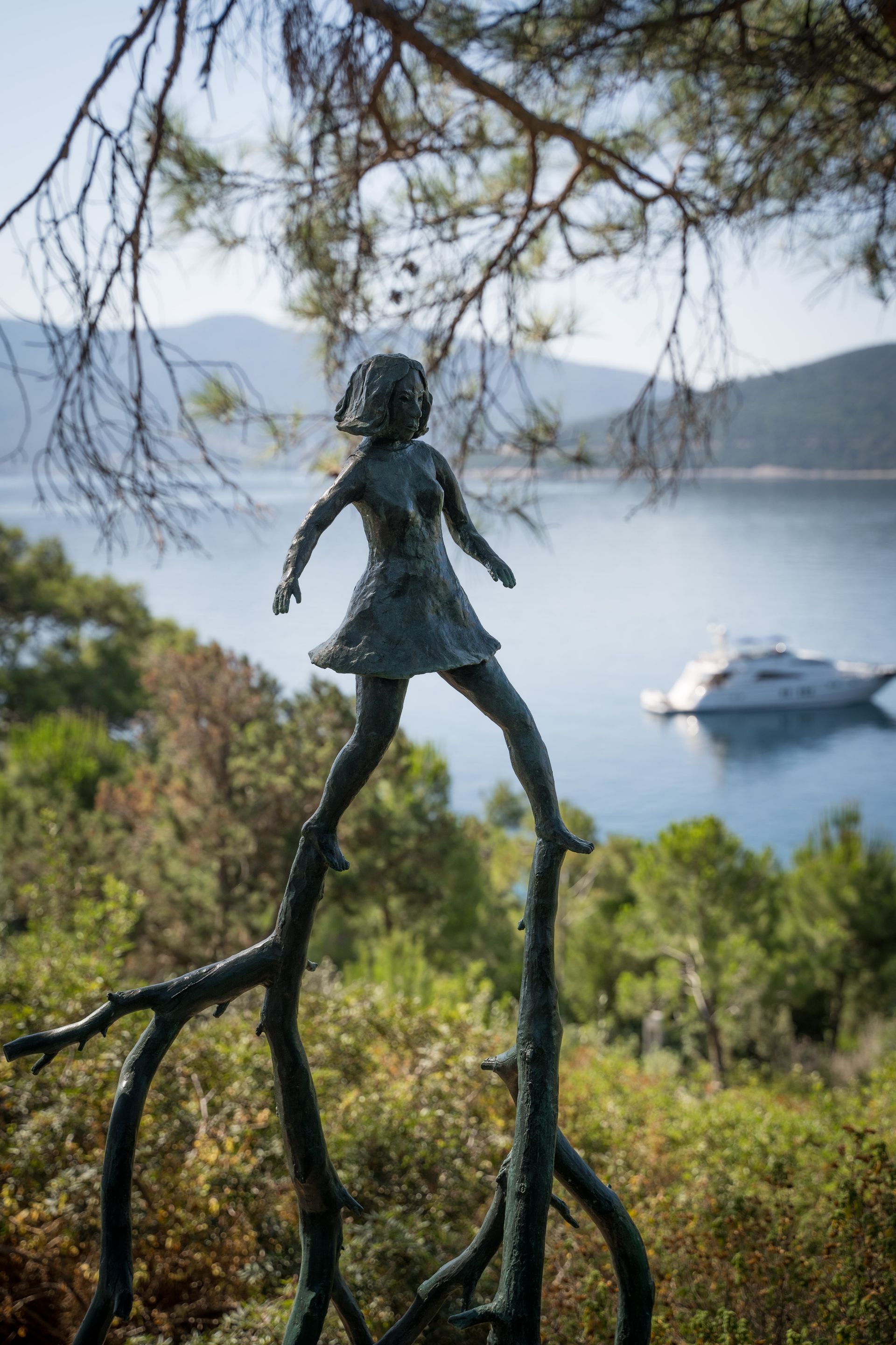 Klara Kristalova striding sculpture in nature at Bodrum Loft / Perrotin exhibition