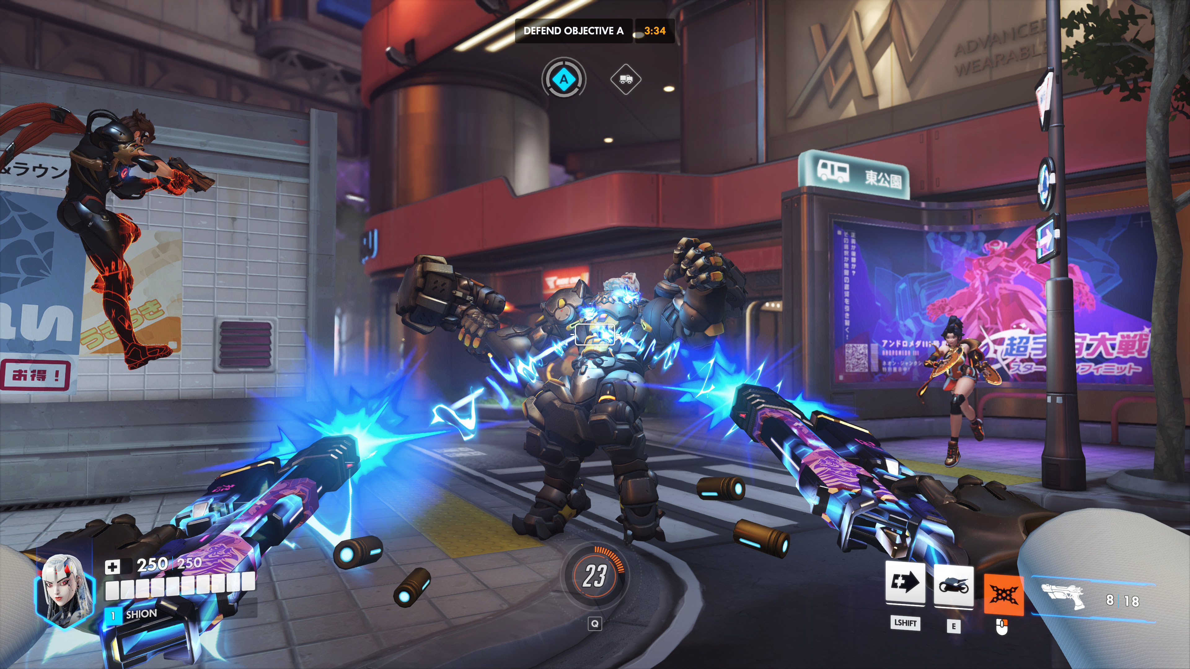 A promotional Overwatch gameplay screenshot of new hero Shion. A first-person view of a Shion unloading her twin pistols onto an enemy Reinhardt.