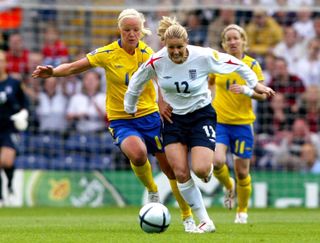 Kelly Smith (right) scored 46 goals in 117 appearances for England (Martin Rickett/PA).