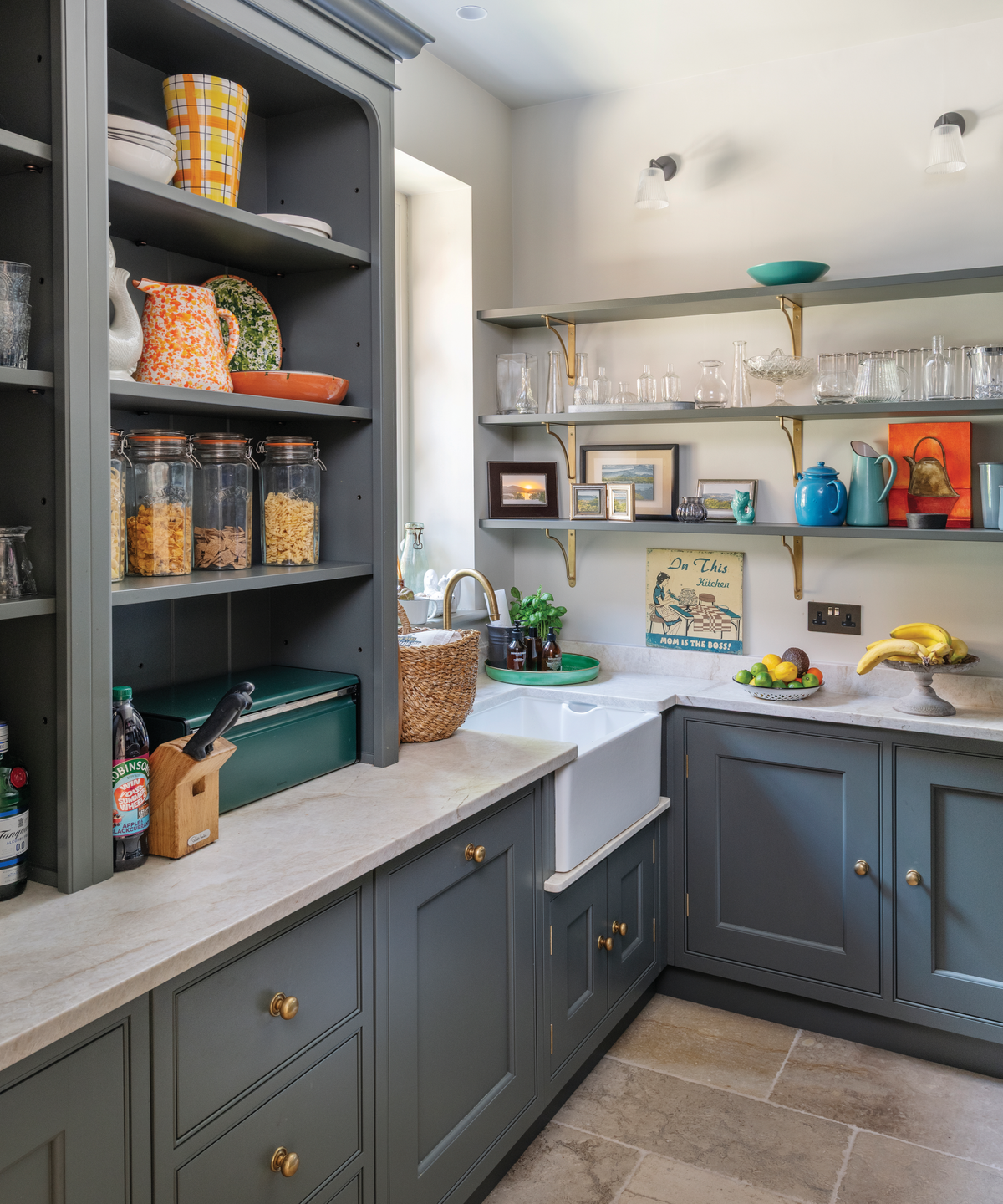 pantry with grey cabinet doors and white worktop