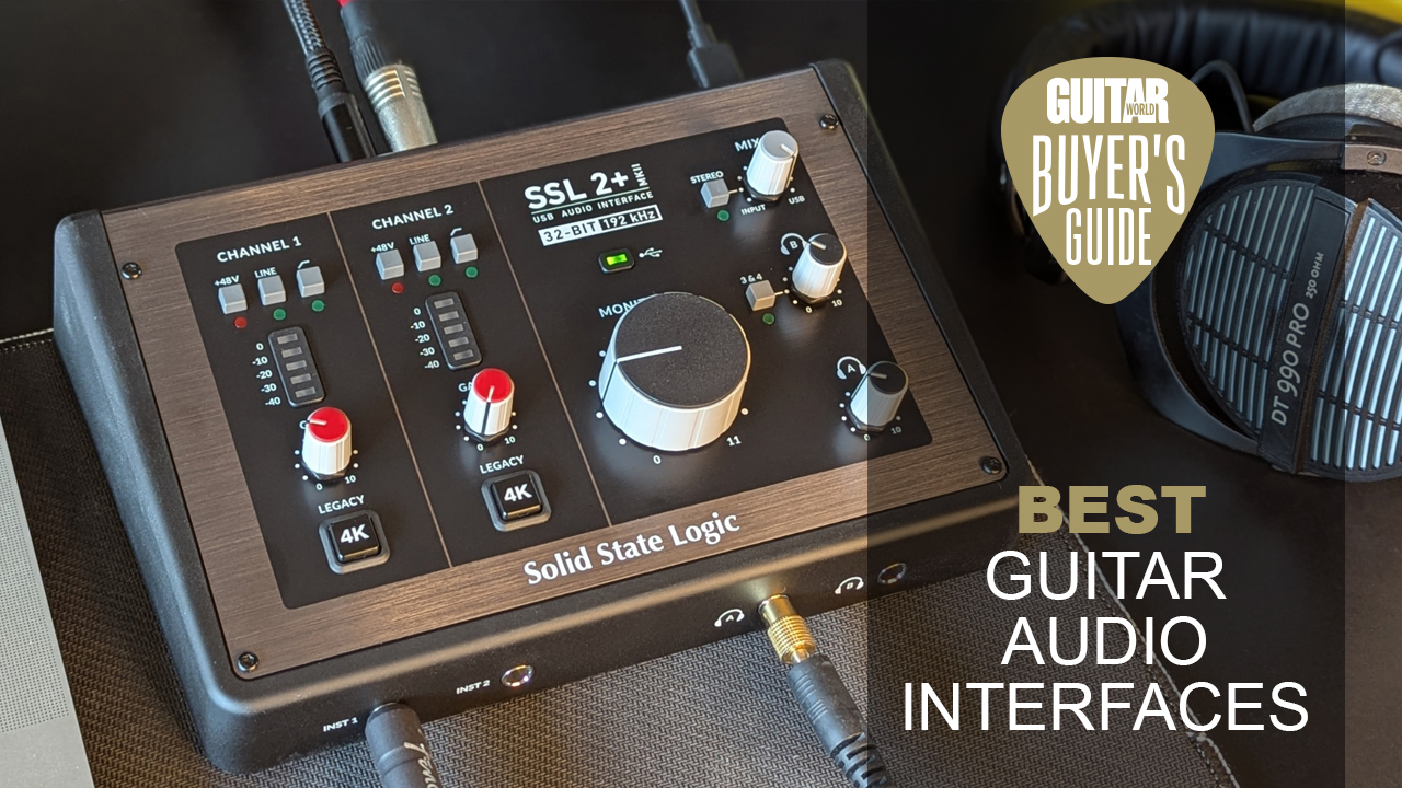 An SSL 2+ MKII audio interface on a desk with a pair of studio headphones