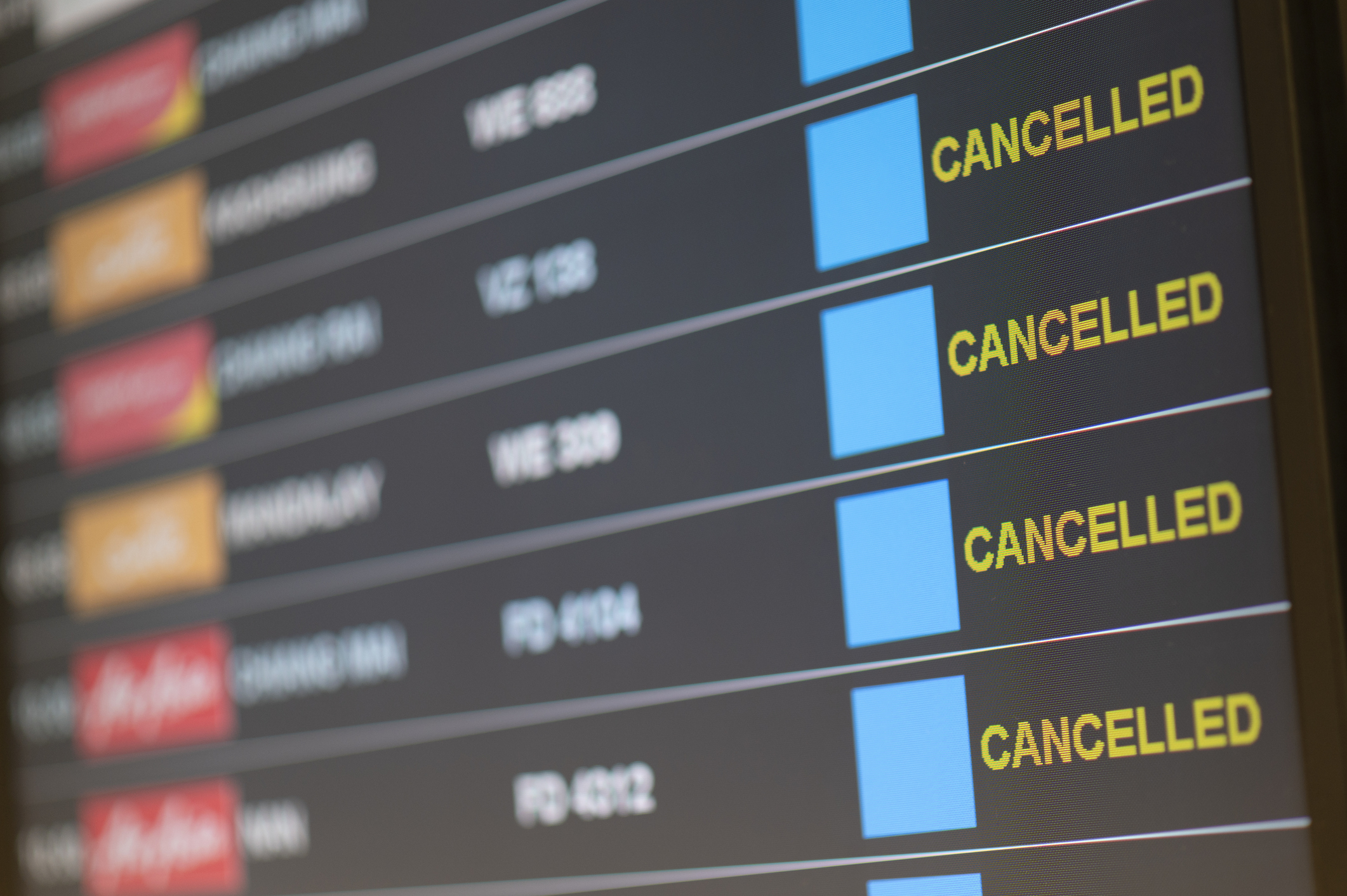 Departure flight board with cancelation at the Airport