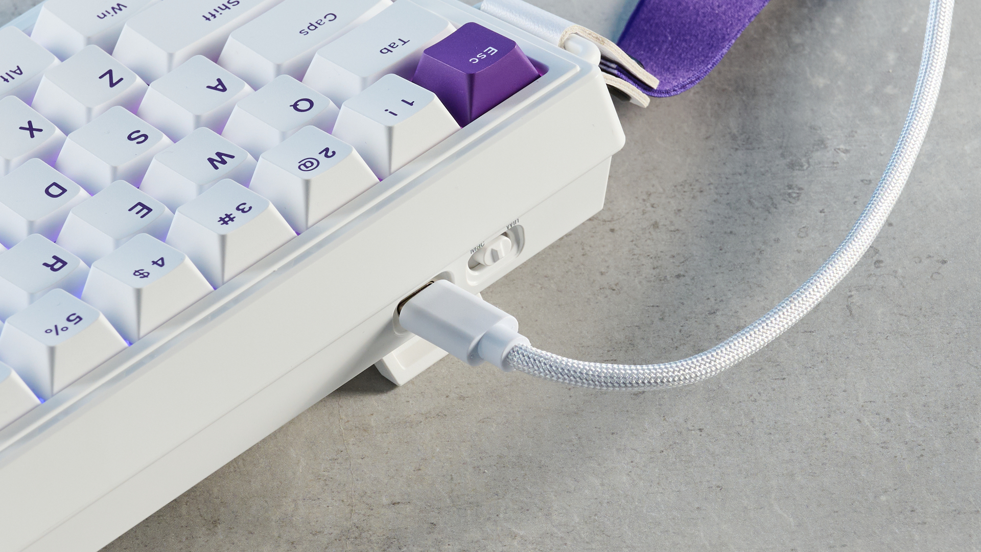 A white and purple Epomaker HE68 Hall Effect keyboard