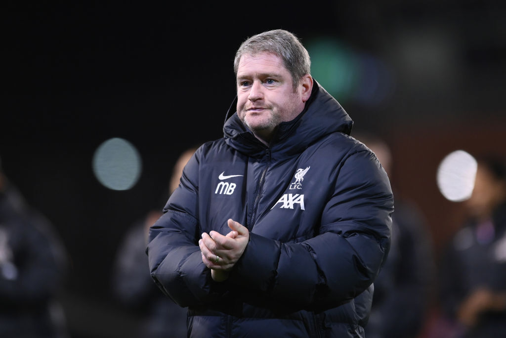 Matt Beard, Manager of Liverpool, shows appreciation to the fans following the Women's League Cup match between Manchester United and Liverpool at Leigh Sports Village on October 02, 2024 in Leigh, England.