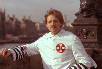 David Duke, 27-year-old Ku Klux Klan leader, poses in his Klan robes in front of the House of Parliament in London in March of 1978.