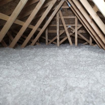 Loose fill cellulose insulation that has been blown in an attic space