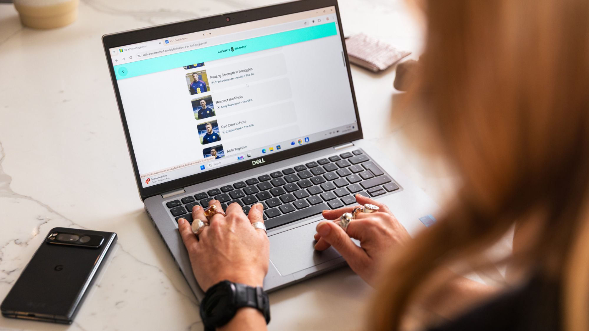 A woman uses EE technology