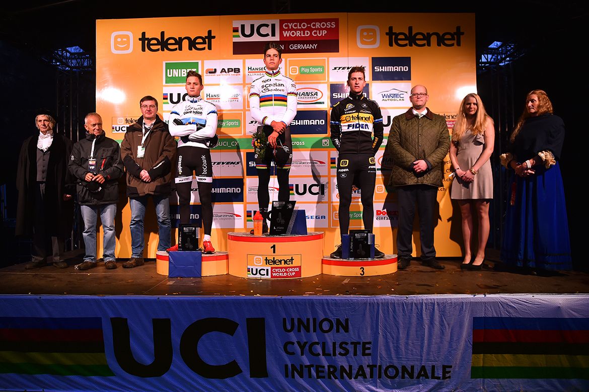 Wout Van Aert (centre) broke Mathieu van der Poel's streak of World Cup wins, while Toon Aerts took third in Zeven.