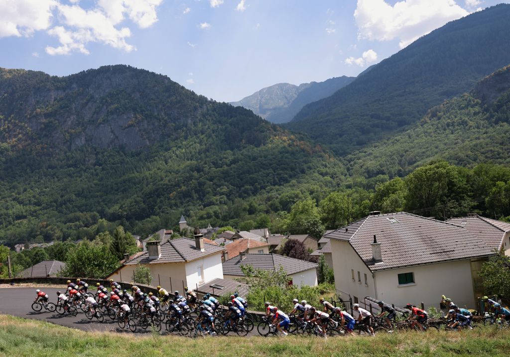 The pack of riders cycles during the 16th stage of the 109th edition of the Tour de France cycling race 1785 km between Carcassonne and Foix in southern France on July 19 2022 Photo by Thomas SAMSON AFP Photo by THOMAS SAMSONAFP via Getty Images