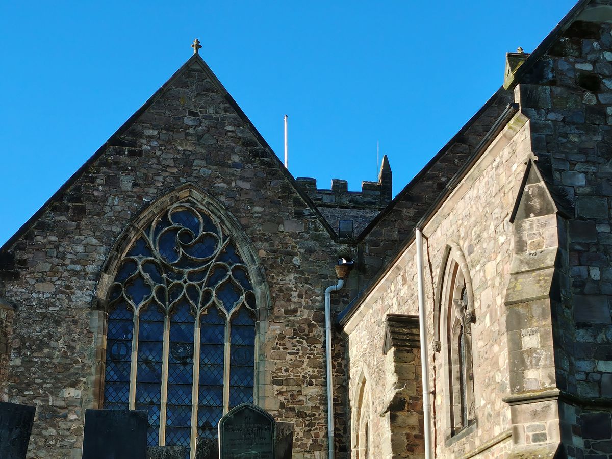 Stone church with large windows