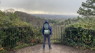Looking over woodland wearing Thule Sapling child carrier