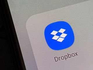 Dropbox mobile icon app on android screen. Dropbox, is the top five online file-sharing services.
