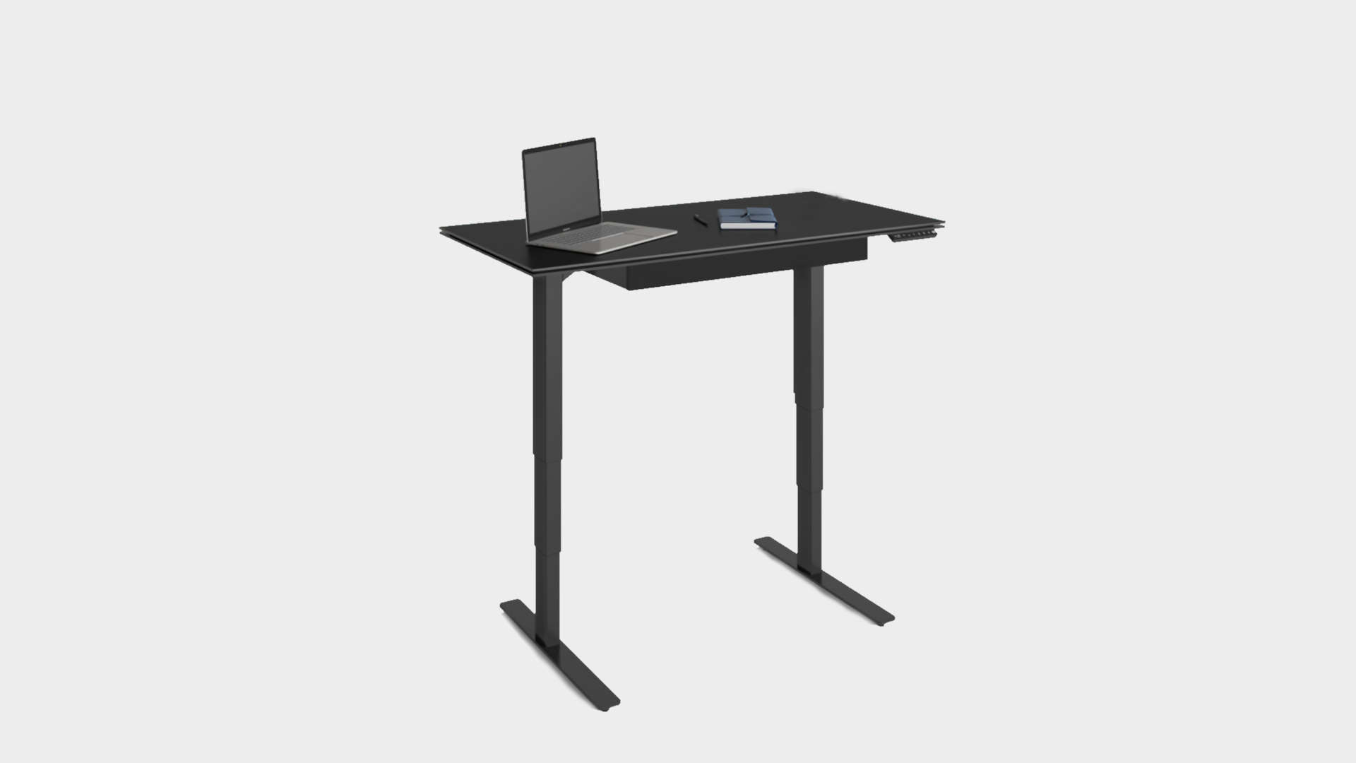 Image of the BDI Stance luxury desk in standing mode from the front at an angle.