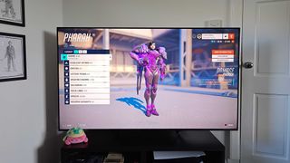 Hisense U7N with posessed Pharah from Overwatch 2 on screen