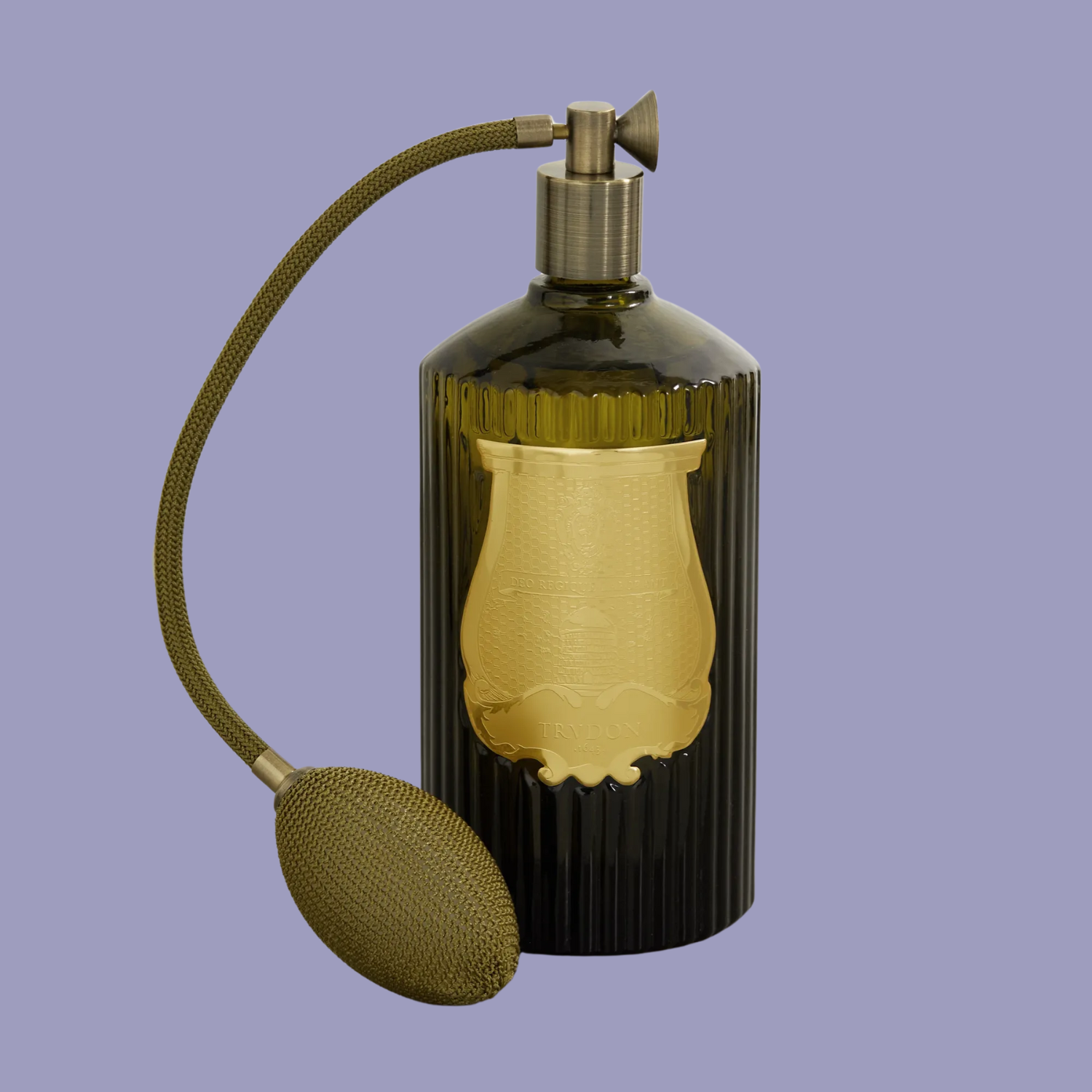 A vintage-style perfume bottle of room spray
