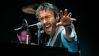Paul Rodgers of Bad Company performs in concert at DTE Energy Center on July 23, 2013 in Clarkston, Michigan.