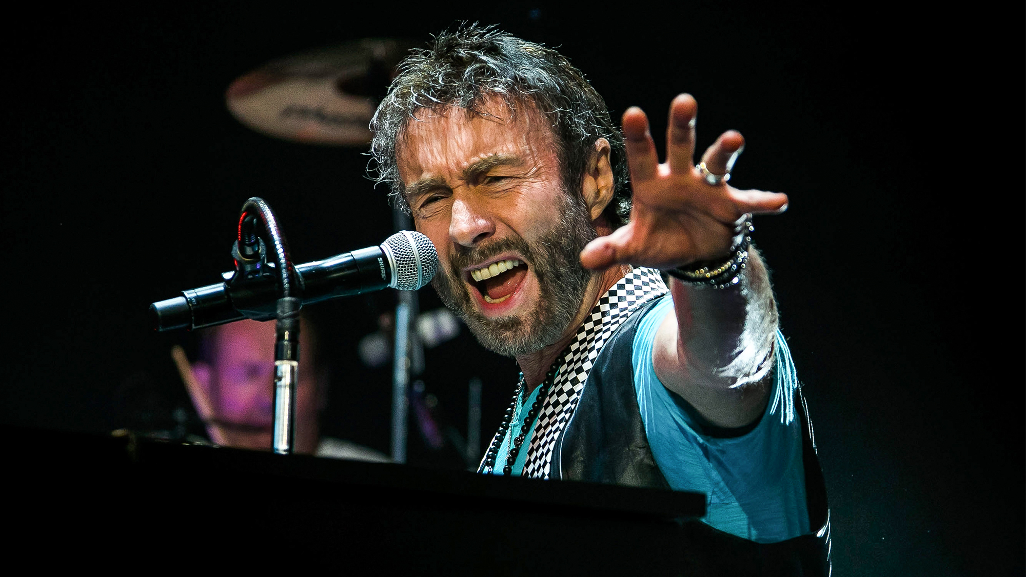 Paul Rodgers of Bad Company performs in concert at DTE Energy Center on July 23, 2013 in Clarkston, Michigan.  