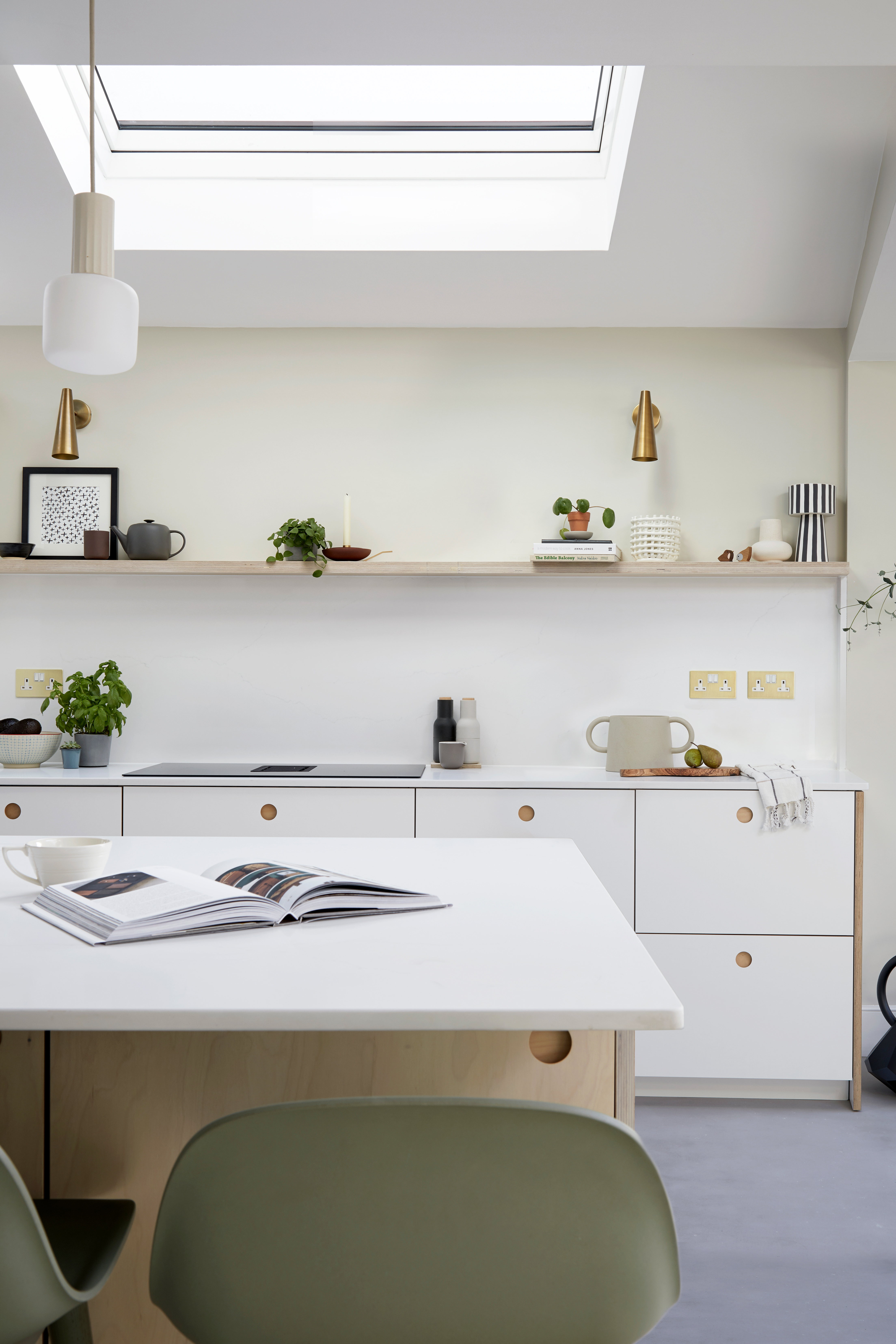 White minimal kitchen with white countertops
