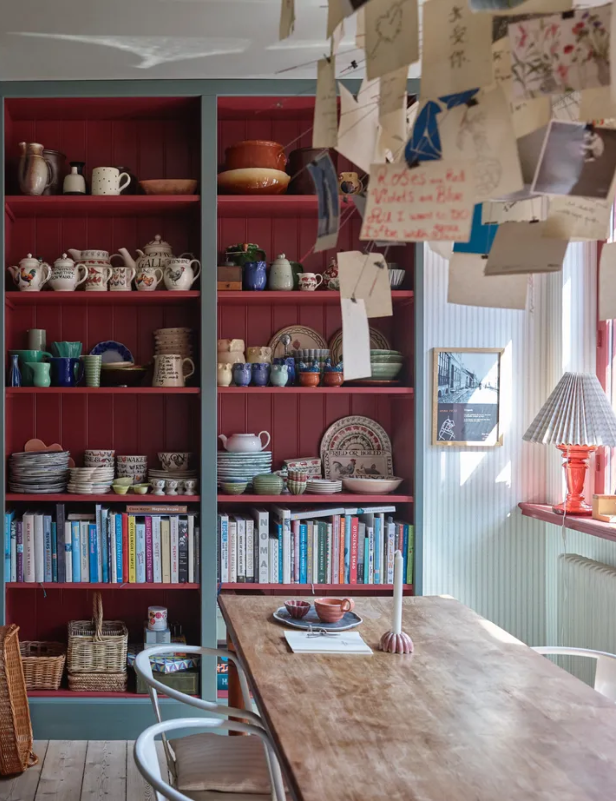 kitchen dining space with open shelving with red shiplap interior, books and crockery, dining table, Farrow &amp;amp; Ball : Asger Mortensen, Wester Agency