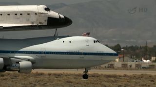 A close-up of NASA's space shuttle Endeavour riding atop its Shuttle Carrier Aircraft just after landing at NASA's Dryden Flight Research Facility near Edwards Air Force Base in Southern California on Sept. 20, 2012.