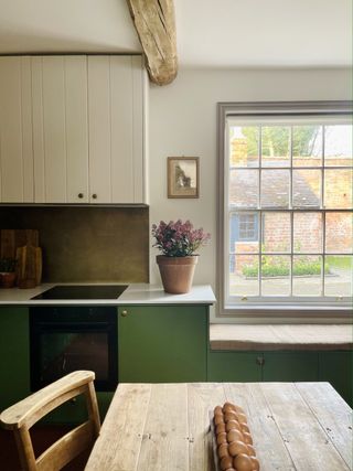 a painted green ikea kitchen