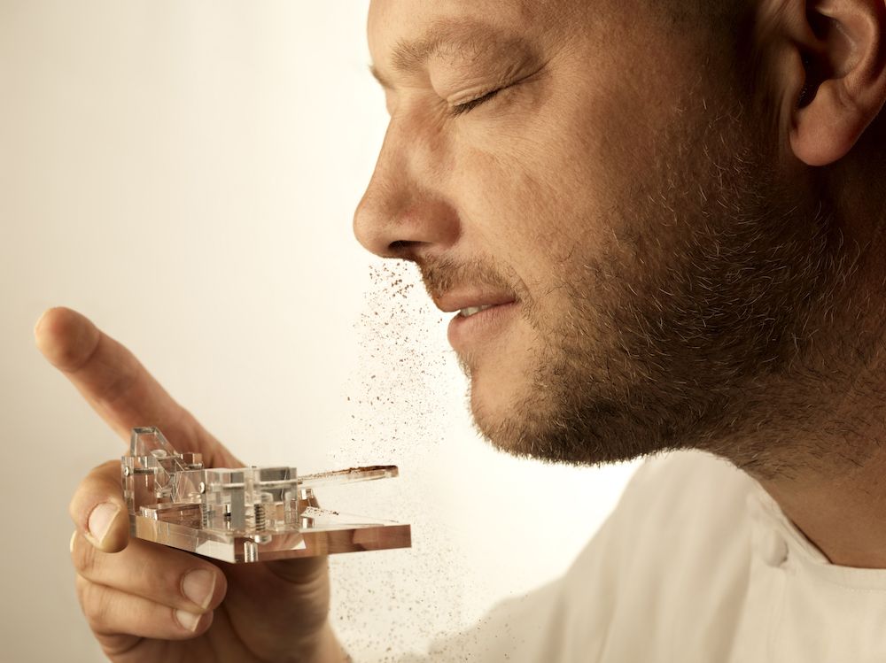 man snorting chocolate