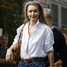 Gigi Hadid wore the mesh Mary Janes trend for fall after the Miu Miu show at Paris Fashion Week
