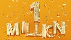 Gold helium balloons spelling out one million surrounded by confetti