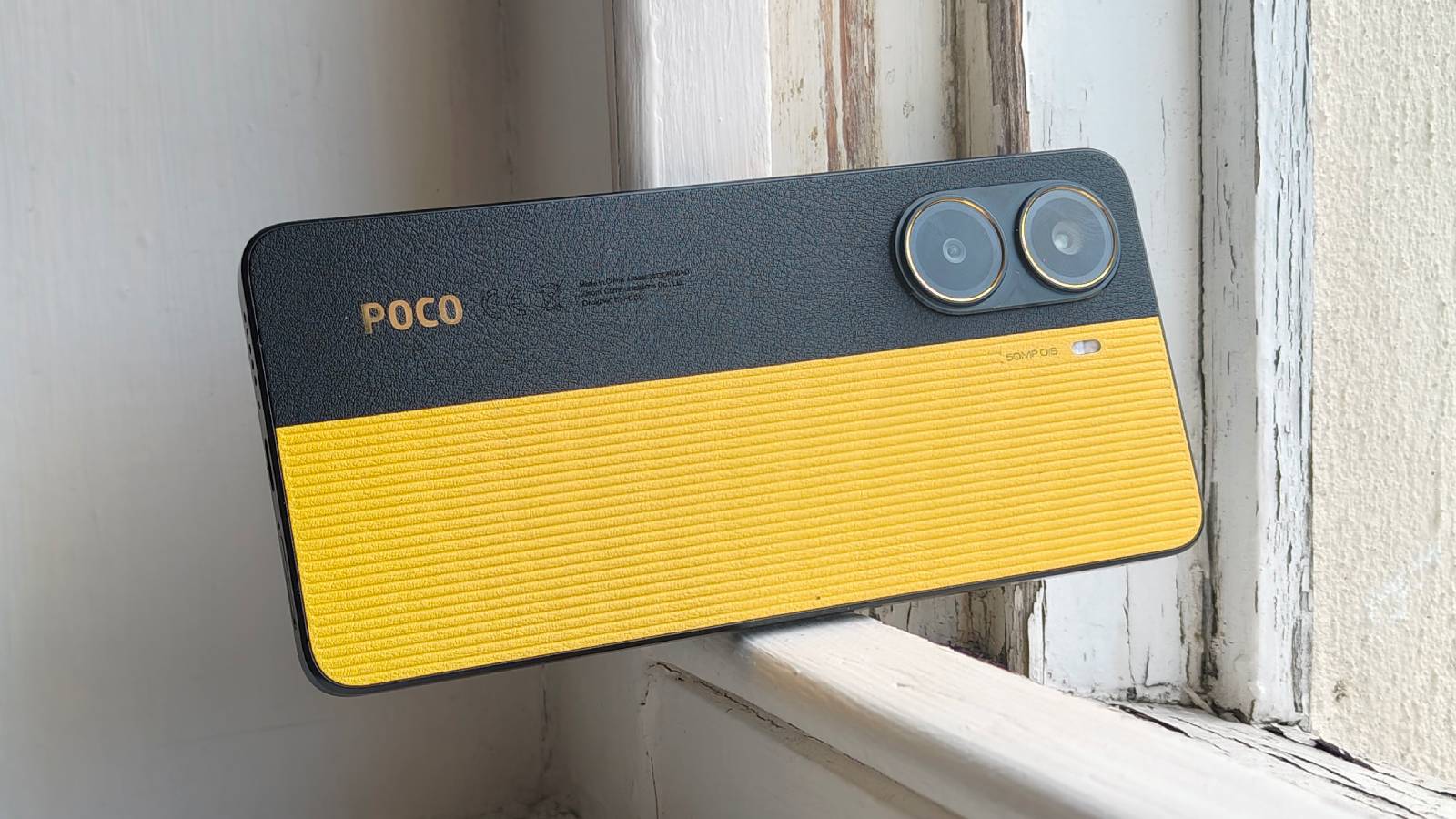 The Xiaomi Poco X7 Pro on a window sill.