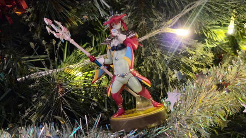 Photo of the Legend of Zelda Sidon amiibo sitting in the branches of a Christmas tree.