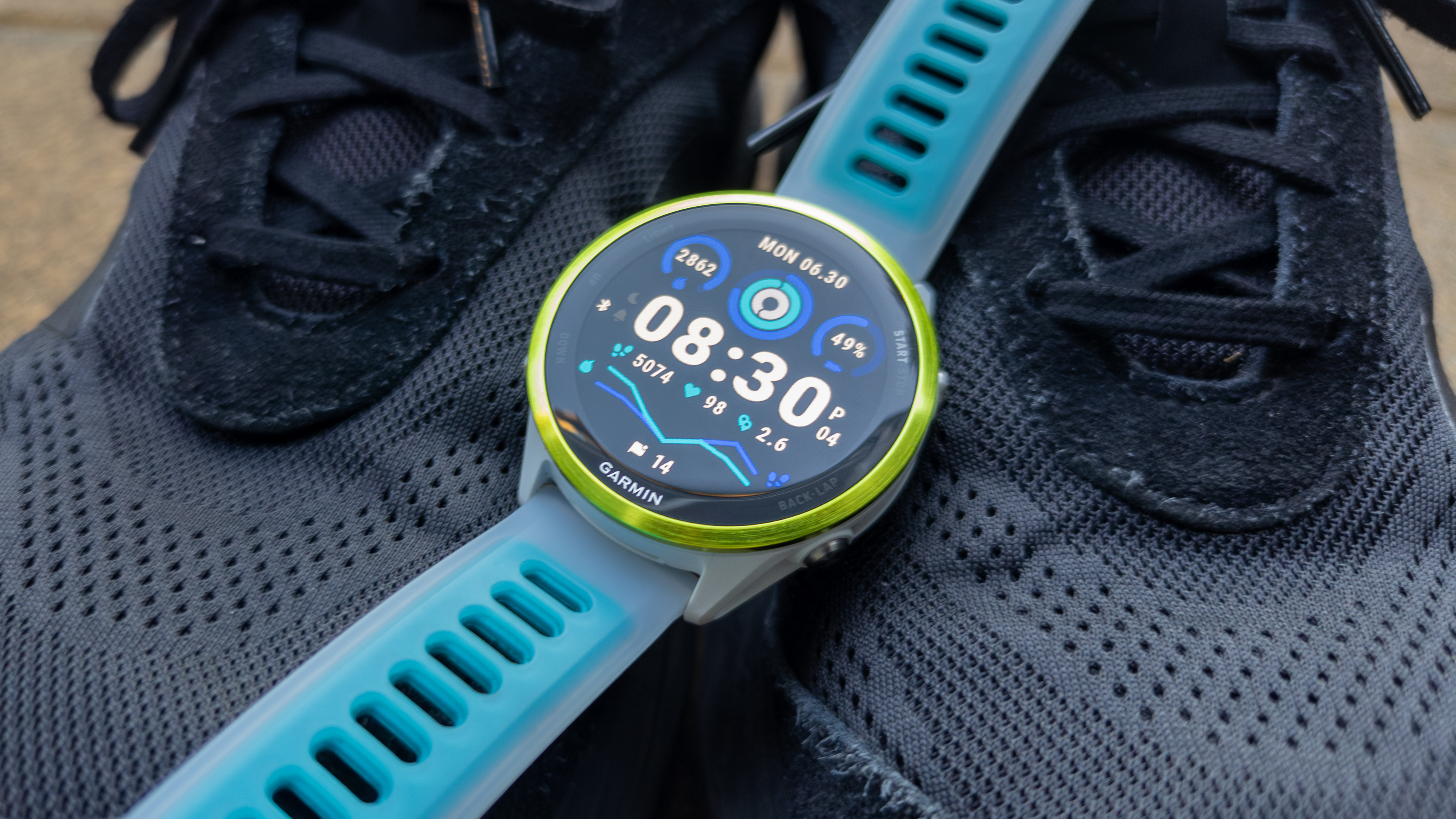 Garmin Forerunner 570 on black shoes