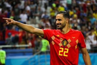 Nacer Chadli celebrates after Belgium's win over Brazil at the 2018 World Cup.