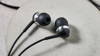 Sennheiser CX 80U earbuds on block