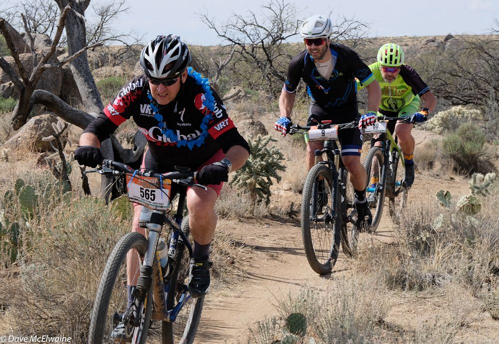Brian Dill (Faster than Flying Javelinas) leads a group of three through the cacti
