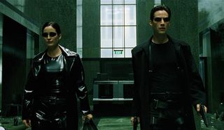 The Matrix Trinity and Neo walk through the lobby
