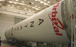 An Orbital Sciences Corp. Antares rocket is seen partially assembled ahead of 2013 test flight.