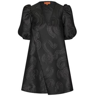 black dress with ruched puffed sleeves