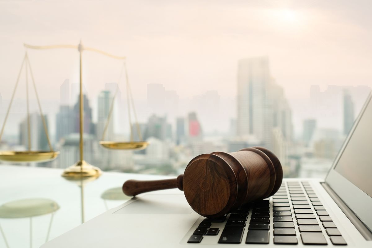 Gavel on a laptop keyboard